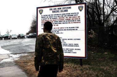 A man enters the road to Rikers Island on March 31st, 2017, in New York City.