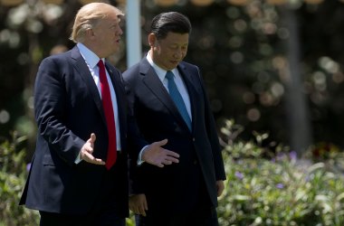 President Donald Trump and Chinese President Xi Jinping walk together at the Mar-a-Lago estate in West Palm Beach, Florida, on April 7th, 2017.