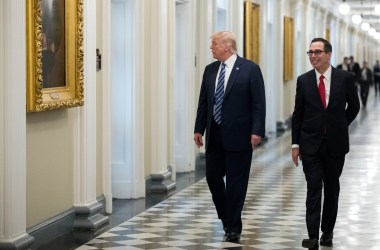 President Donald Trump and Secretary of the Treasury Steven Mnuchin walk to a meeting on April 21st, 2017.