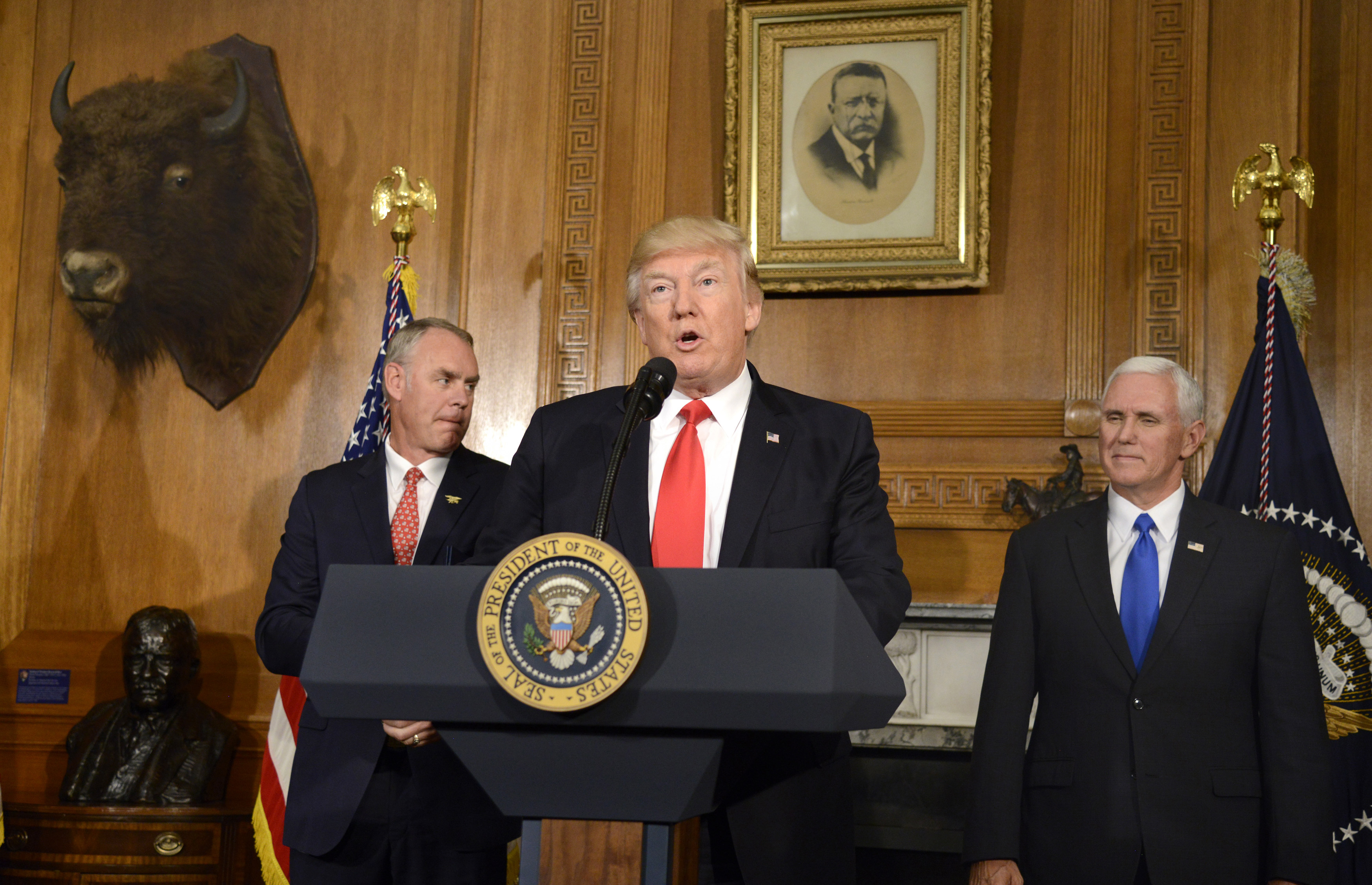 President Donald Trump makes remarks as Secretary of the Interior Ryan Zinke and Vice President Mike Pence listen prior to signing an Antiquities Executive Order on April 26th, 2017.