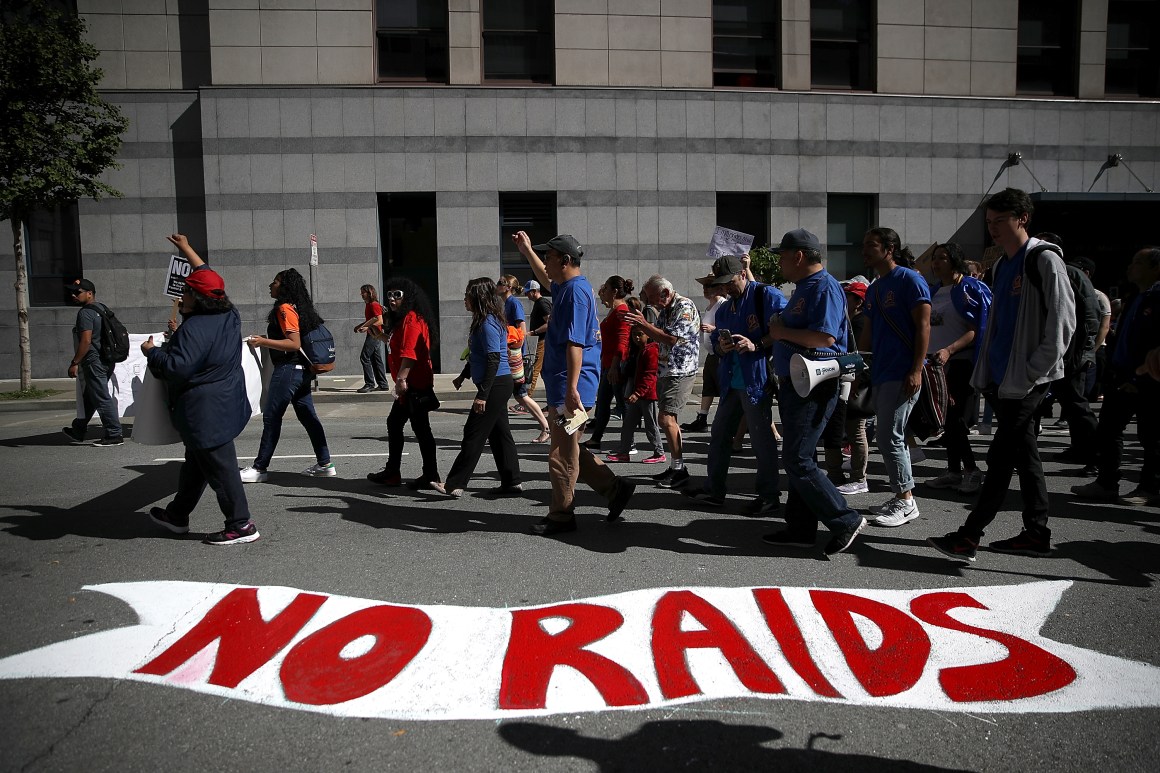 Protesters march during a May Day demonstration outside a U.S. Immigration and Customs Enforcement (ICE) office in San Francisco