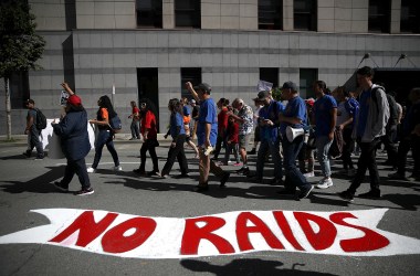 Protesters march during a May Day demonstration outside a U.S. Immigration and Customs Enforcement (ICE) office in San Francisco