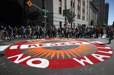 Protesters march during a May Day demonstration outside a U.S. Immigration and Customs Enforcement office in San Francisco, California, on May 1st, 2017.