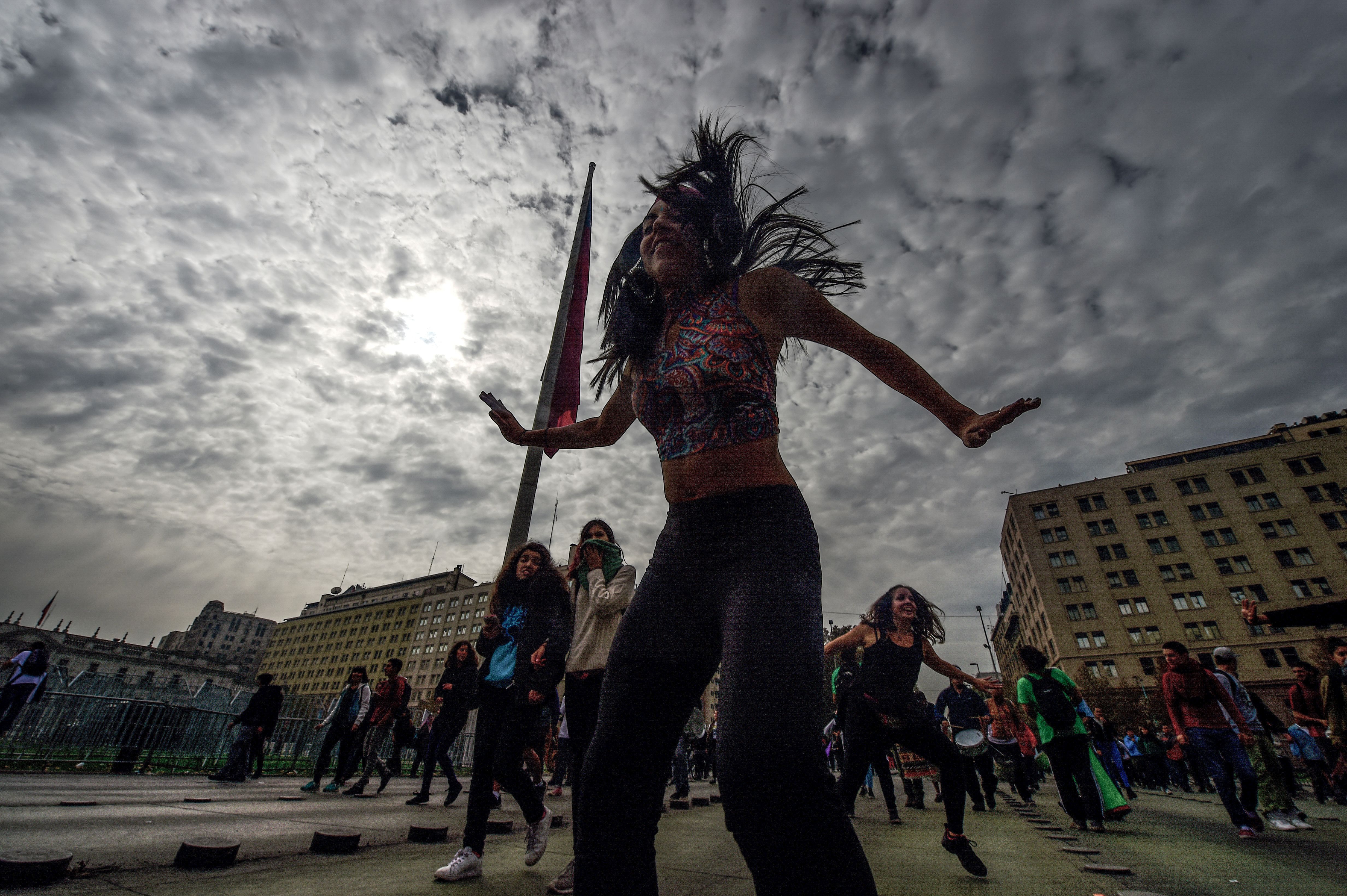 Students dance during a protest against education reform in Santiago on May 9th, 2017.