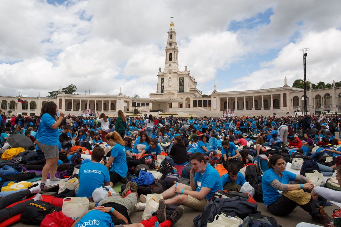 Young pilgrims wait for the arrival of Pope Francis at the Sanctuary of Fatima on May 12th, 2017, in Fatima, Portugal.