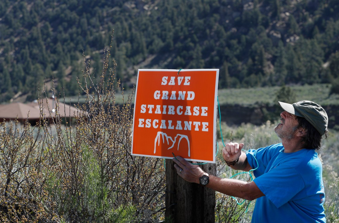 Bob Morgan hangs a monument support sign at his house in the Grand Staircase-Escalante National Monument on May 11th, 2017, outside Escalante, Utah.