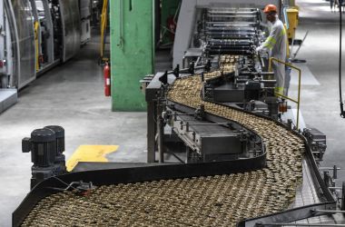 A man works in a production line of the Nestle Purina plant on May 18th, 2017, in central France.