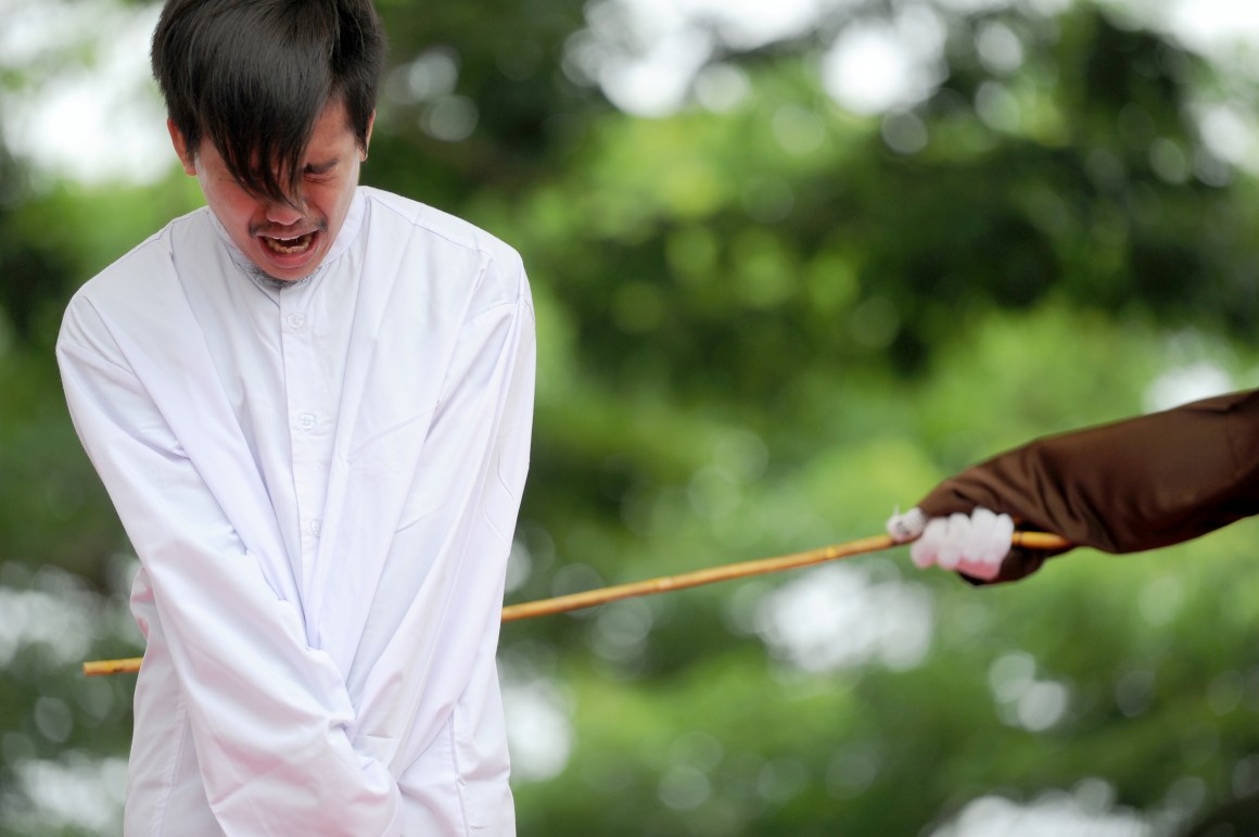 One of two Indonesian men is publicly caned for having sex, in a first for the Muslim-majority country where there are concerns over mounting hostility toward the small gay community, in Banda Aceh on May 23rd, 2017.