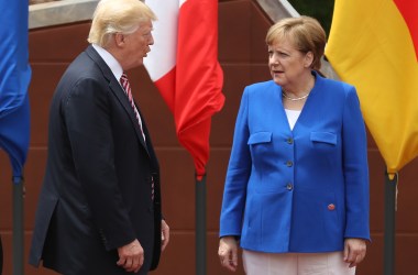 German Chancellor Angela Merkel and President Donald Trump arrive for the group photo at the G7 Taormina summit on the island of Sicily on May 26th, 2017.