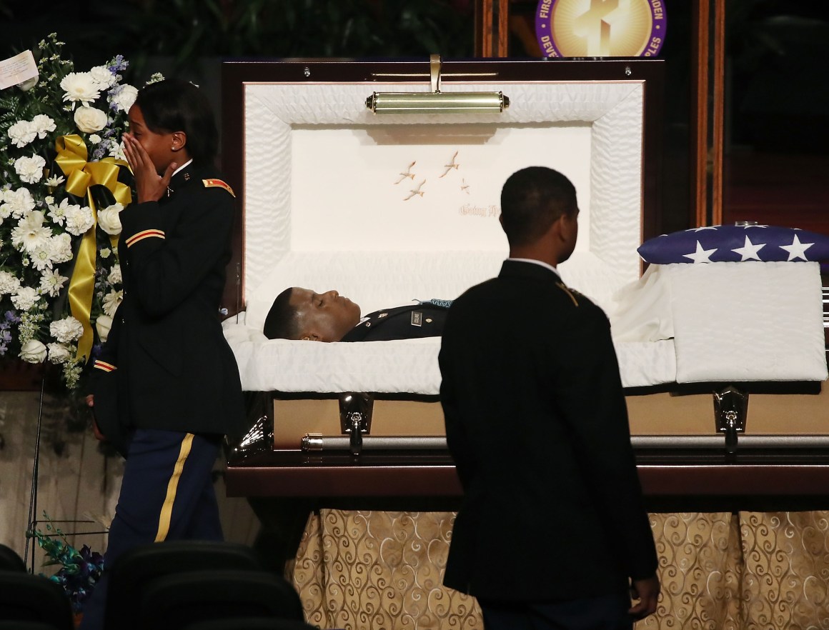 Mourners pay their respects during a funeral service for 2nd Lieutenant Richard Collins III in Upper Marlboro, Maryland, on May 26th, 2017.