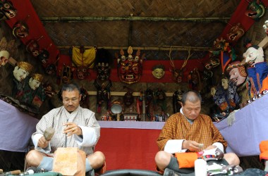 Bhutanese men prepare traditional shoes at a Folk Heritage Museum in Thimphu on June 1st, 2017, during a visit there by Japanese Princess Mako.