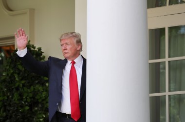 President Donald Trump waves goodbye after announcing his decision to pull the United States out of the Paris climate agreement in the Rose Garden at the White House on June 1st, 2017.