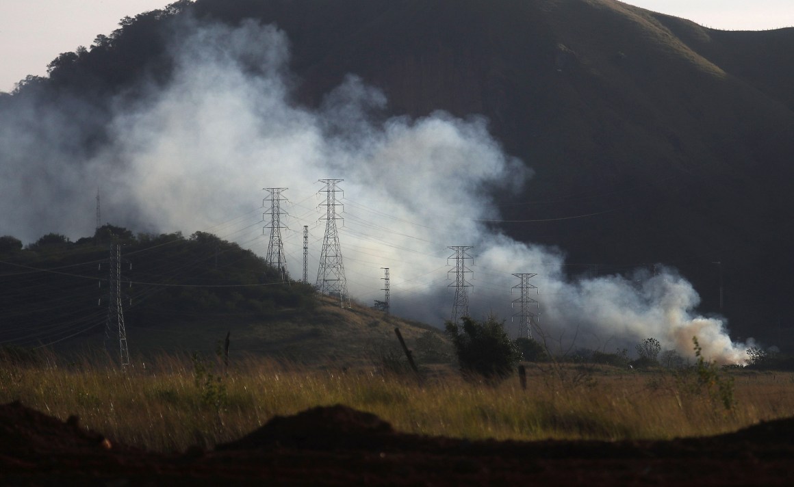 A brush fire burns in a deforested section of the Atlantic Forest.