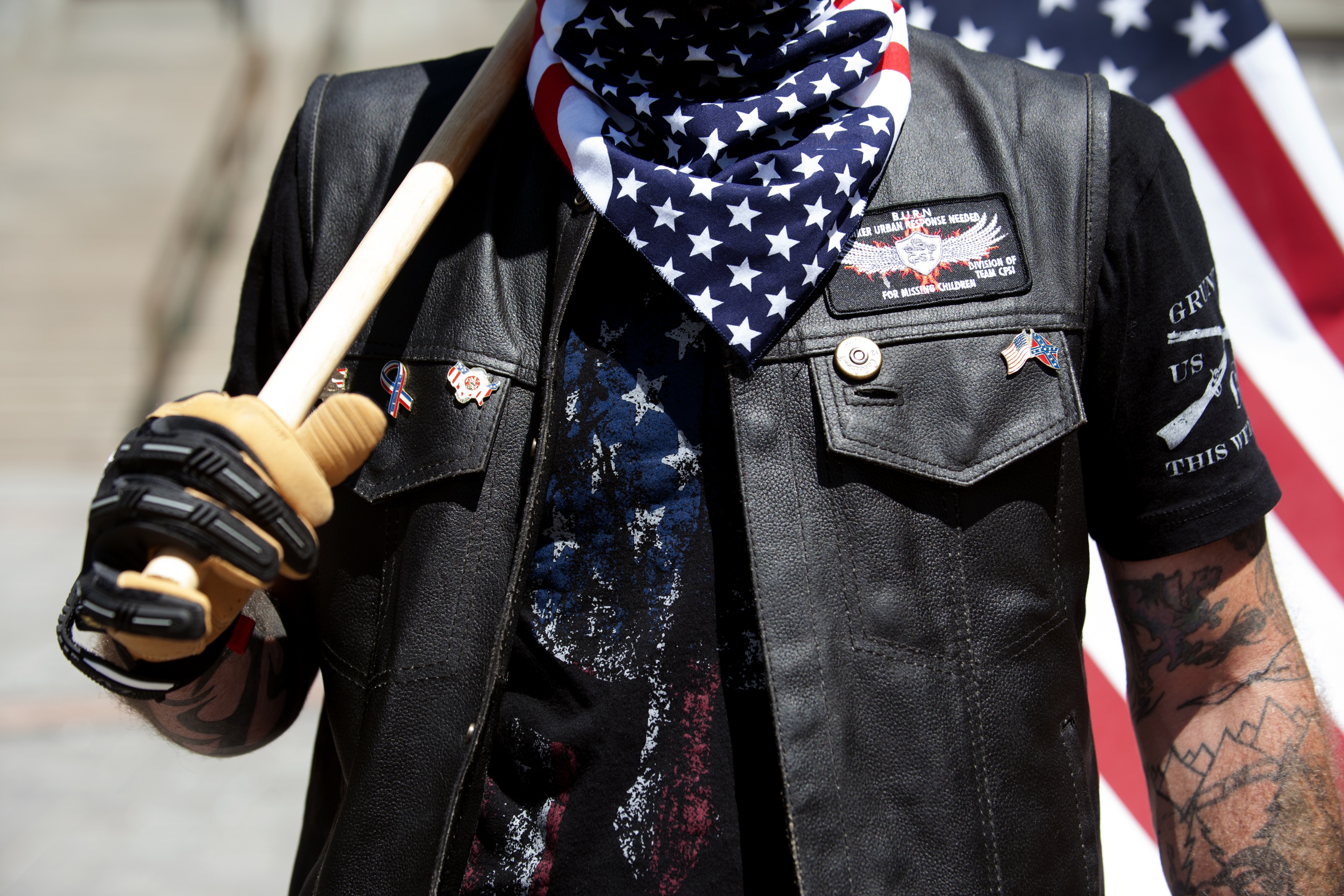 A right-wing demonstrator participates in the Denver March Against Sharia Law in Denver, Coloradom on June 10th, 2017. The march was supported by two right-wing groups, The Proud Boys, and Bikers Against Radical Islam.