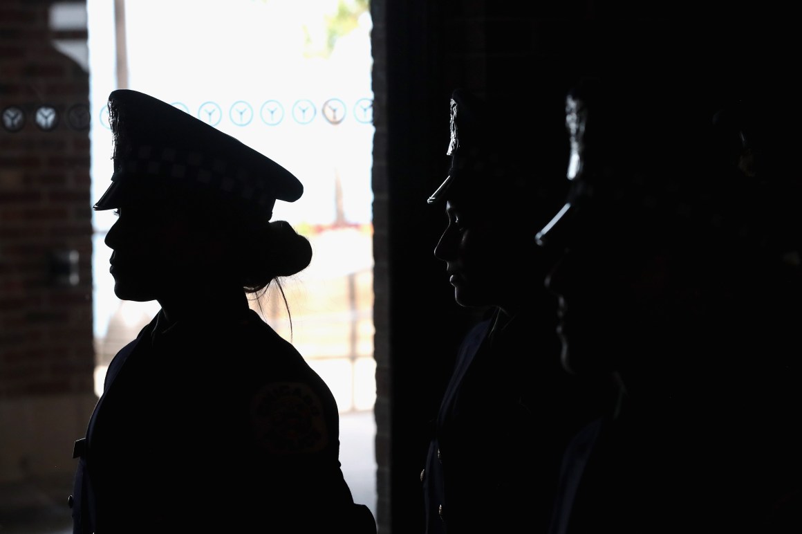 Chicago police officers attend a graduation and promotion ceremony in the Grand Ballroom on Navy Pier on June 15th, 2017, in Chicago, Illinois.