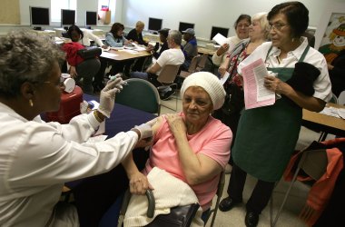 A woman receives a flu shot in Chicago, Illinois.