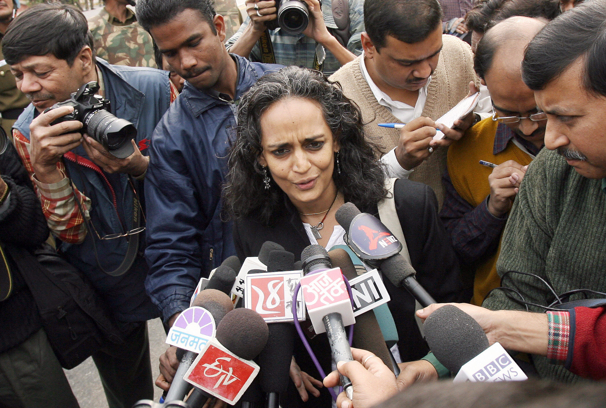 Roy talks to reporters during a protest in West Bengal.