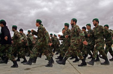 Afghan Army soldiers march to a briefing at Camp Shorabak in Afghanistan's Helmand province.