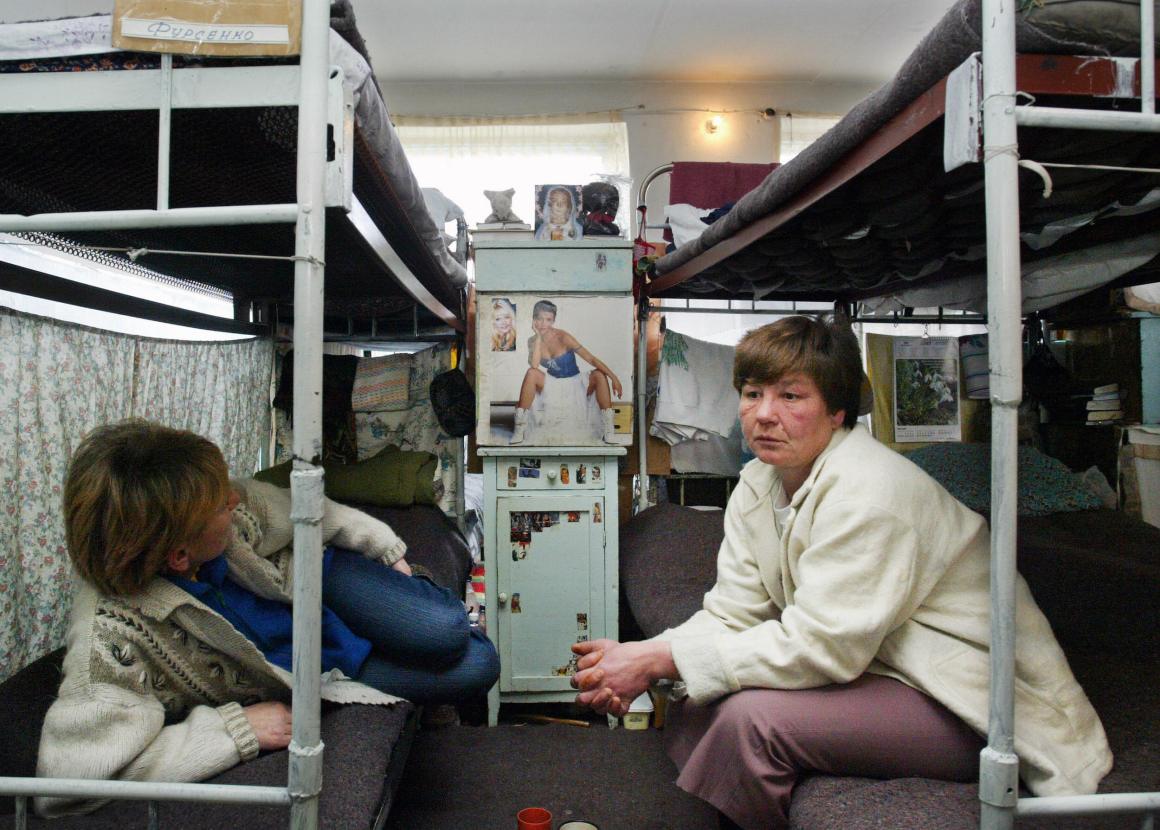 A picture taken on March 8th, 2007, shows two prisoners speaking to each other at a women's prison in the village of Stepnoye, Kyrgyzstan.