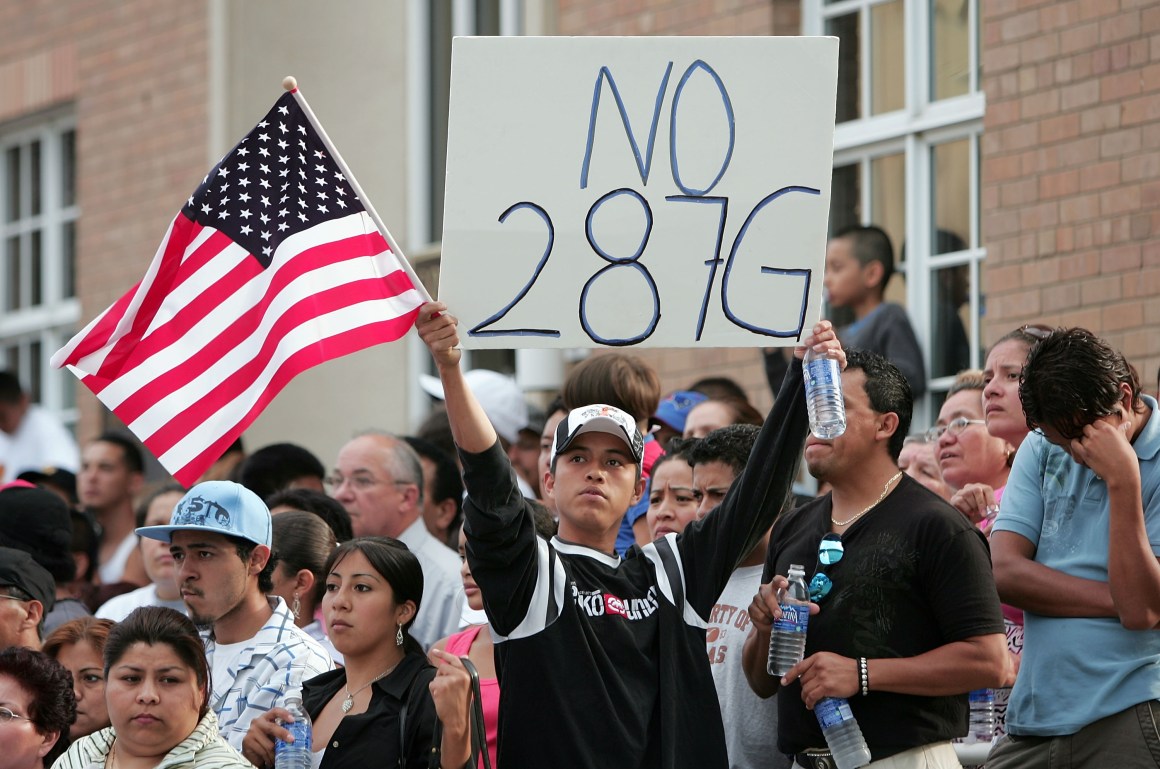 Demonstrators opposing proposition 287(g) gather on July 16th, 2007, in Waukegan, Illinois.