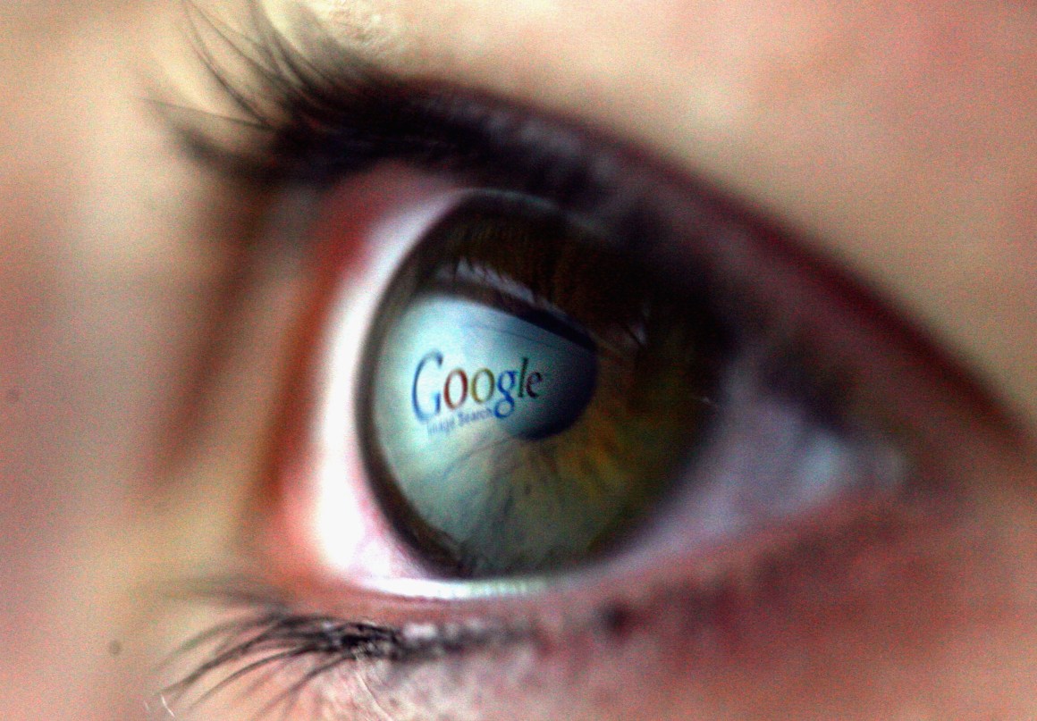 The Google logo reflected in the eye of a girl.