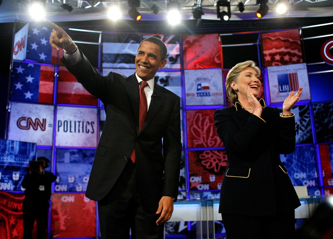 Democratic presidential hopefuls U.S. Sen. Barack Obama (D-IL) and U.S. Sen. Hillary Clinton (D-NY) wave to the audience as they participate in a debate in the Lyndon B. Johnson Auditorium at the University of Texas on February 21st, 2008 in Austin, Texas.