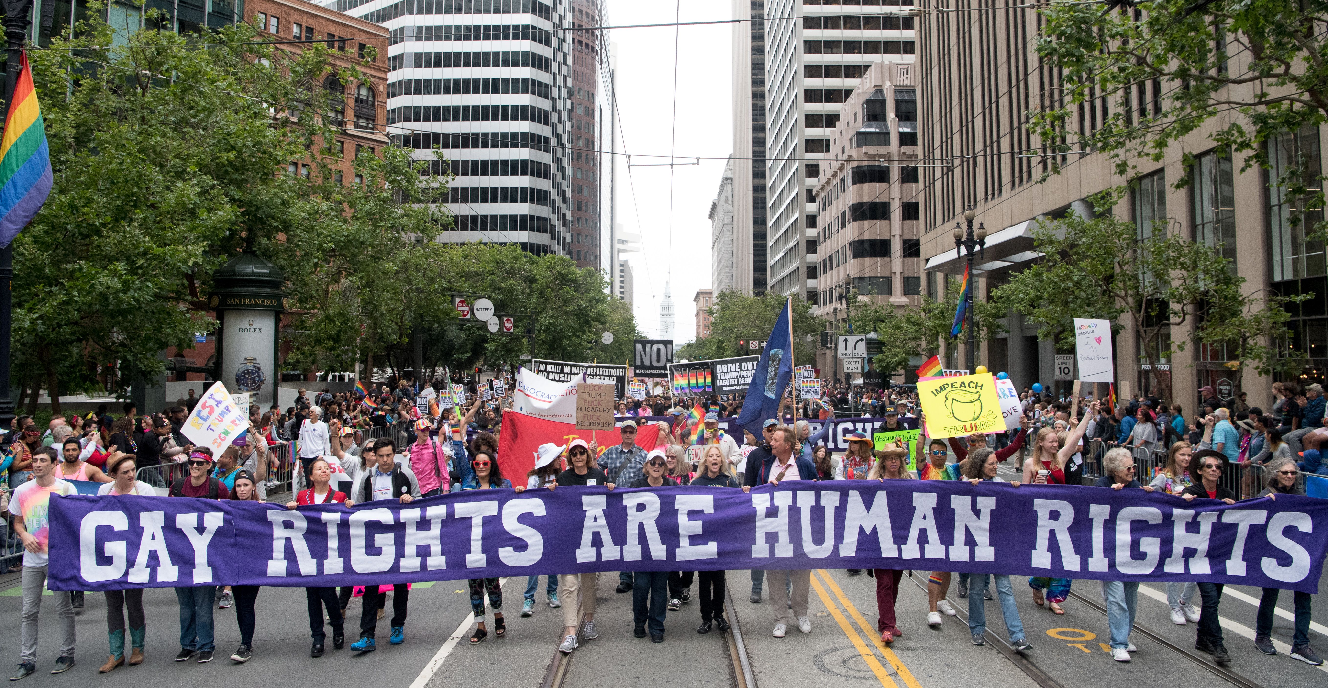 People participate in the San Francisco Pride parade in San Francisco, California, on June 25th, 2017.