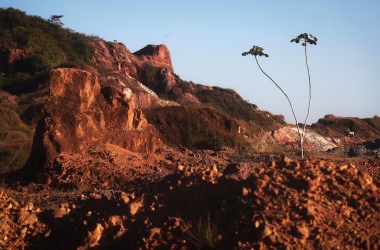 Amazon soil sits in the foreground at the Bom Futuro open air tin mine.