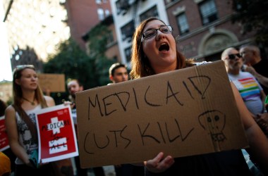 A group of activists rally against the GOP health-care plan on July 5th, 2017, in New York City.