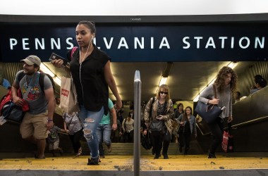 Commuters exit Penn Station during the morning rush hour on July 7th, 2017, in New York City.