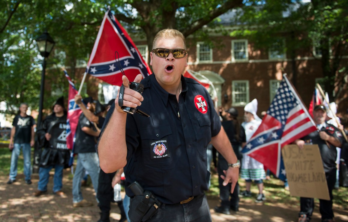 A member of the Ku Klux Klan shouts at counter-protesters during a rally in Charlottesville, Virginia, on July 8th, 2017.