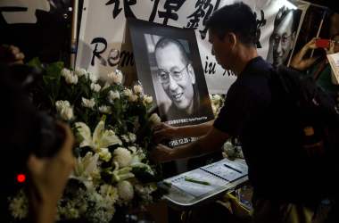 Protesters pay their respects outside the Chinese Liason Office of Hong Kong after the death of Chinese Noble laureate Liu Xiaobo, in Hong Kong on July 13th, 2017. The United States called on China to free the dissident's widow from house arrest and let her leave the country.