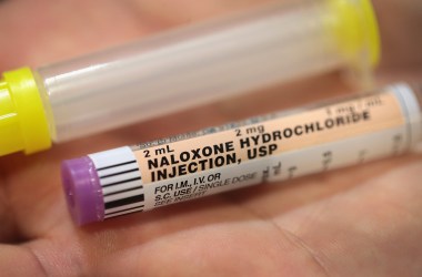 A Rockford firefighter displays a dose of Naloxone which the department carries on their ambulances to treat opioid drug overdoses, on July 14th, 2017, in Rockford, Illinois.