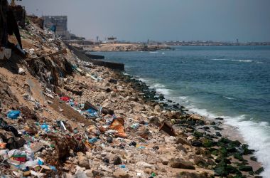 A general view taken on July 2nd, 2017, shows rubbish strewn along the coastline in Gaza City.