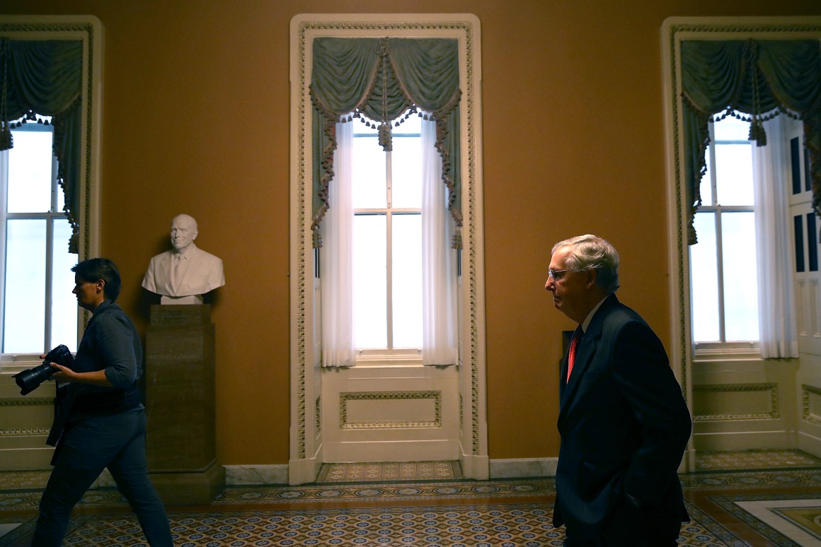 Senate Majority Leader Mitch McConnell walks to his office on July 26th, 2017, in Washington, D.C.