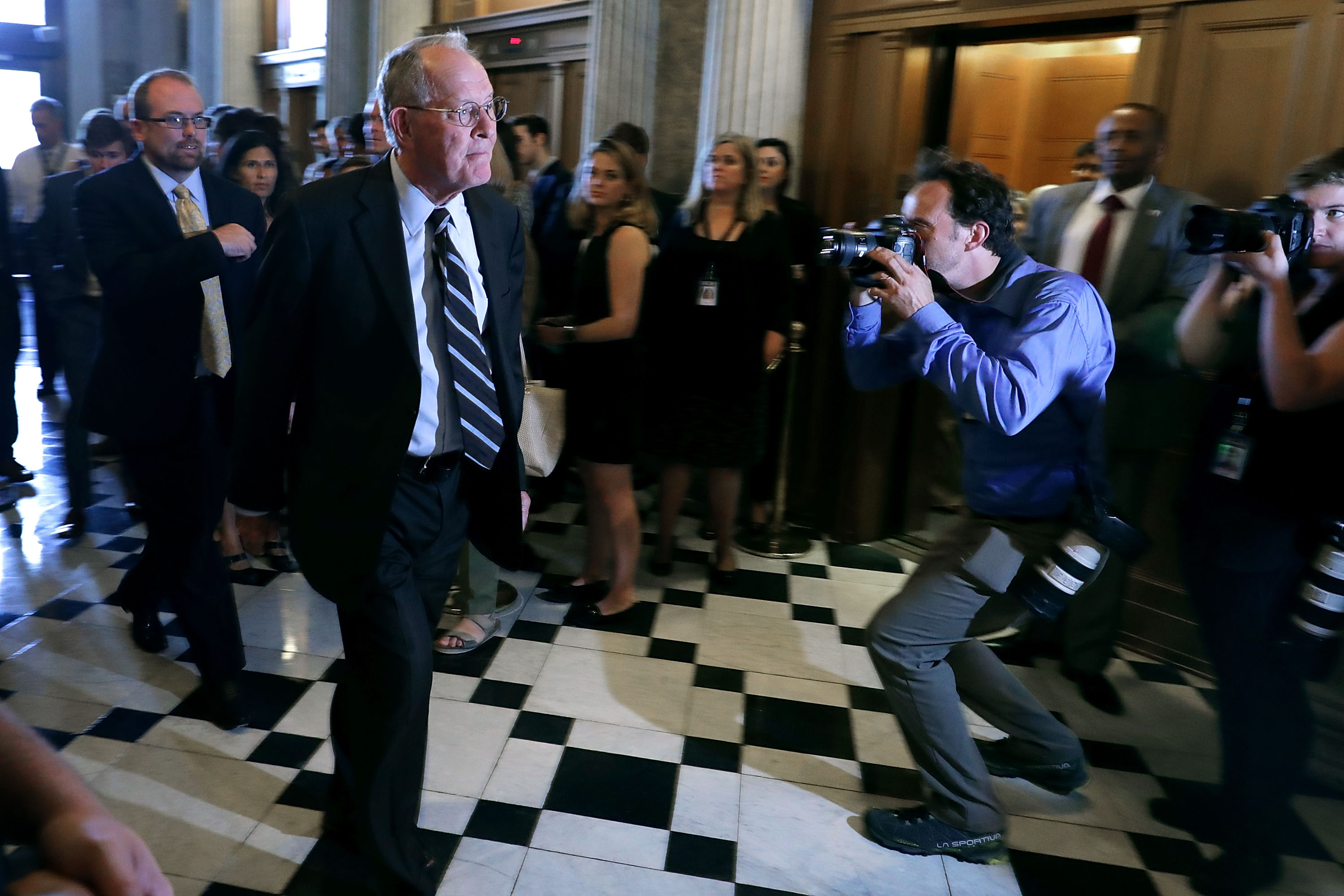 Senator Lamar Alexander walks to the Senate Chamber on July 26th, 2017, in Washington, D.C.