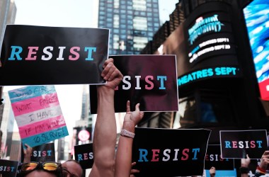 Protesters gather in Times Square near a military recruitment center to show their anger at President Donald Trump's decision to reinstate a ban on transgender individuals from serving in the military on July 26th, 2017, in New York City.