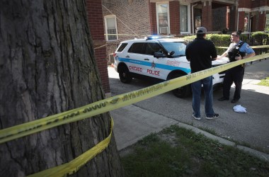 Chicago Police guard evidence near a murder scene in the Humboldt Park neighborhood on July 27th, 2017, in Chicago, Illinois.