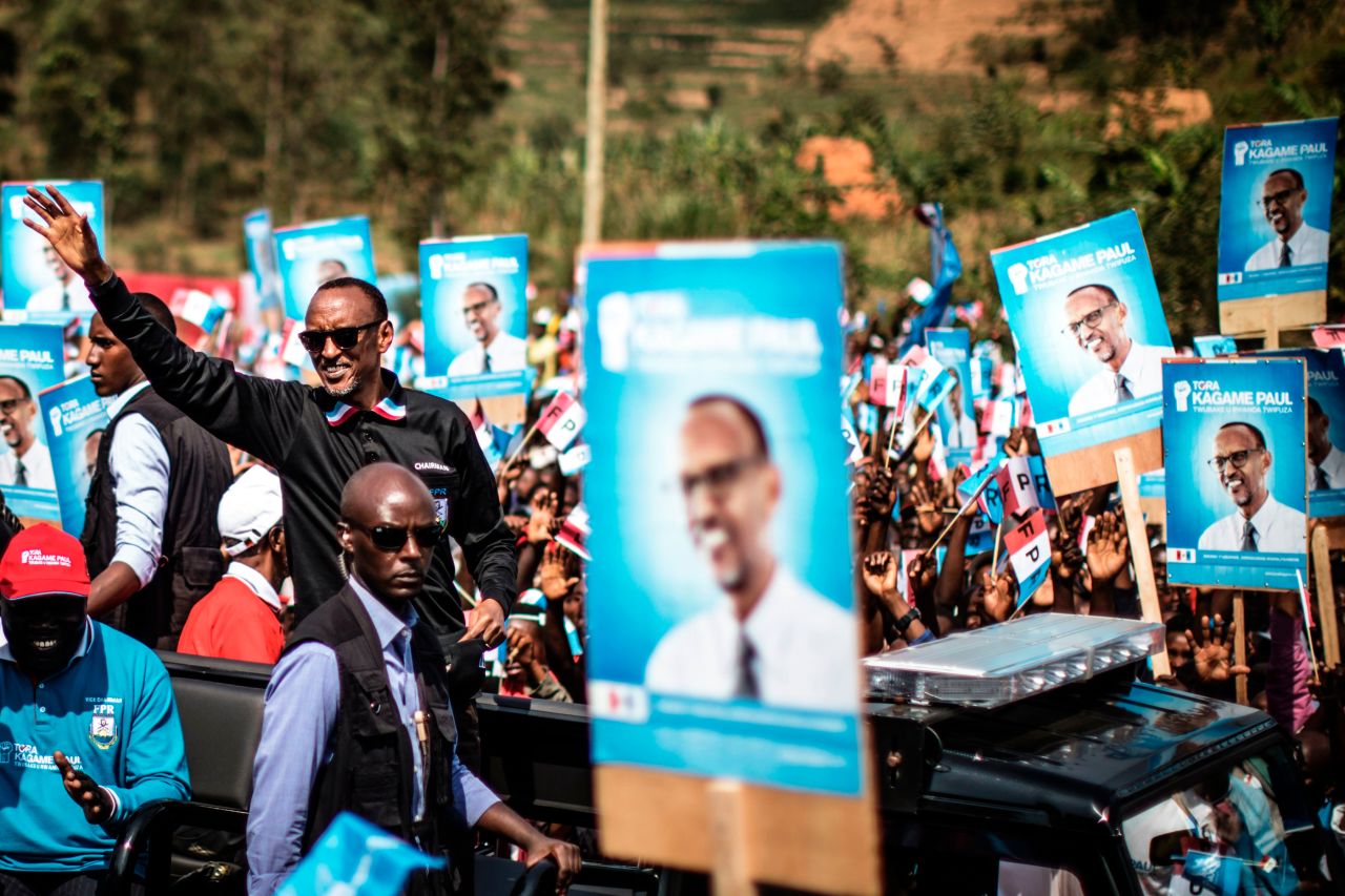 Incumbent Rwandan President Paul Kagame (L) greets a crowd of supporters as he arrives for a campaign rally on July 31st, 2017, in Gakenke ahead of the August 4th presidential election. Kagame and his Rwanda Patriotic Front Party have held an iron grip on power since overthrowing the extremist Hutu regime, which perpetrated the 1994 genocide of 800,000 Tutsis.