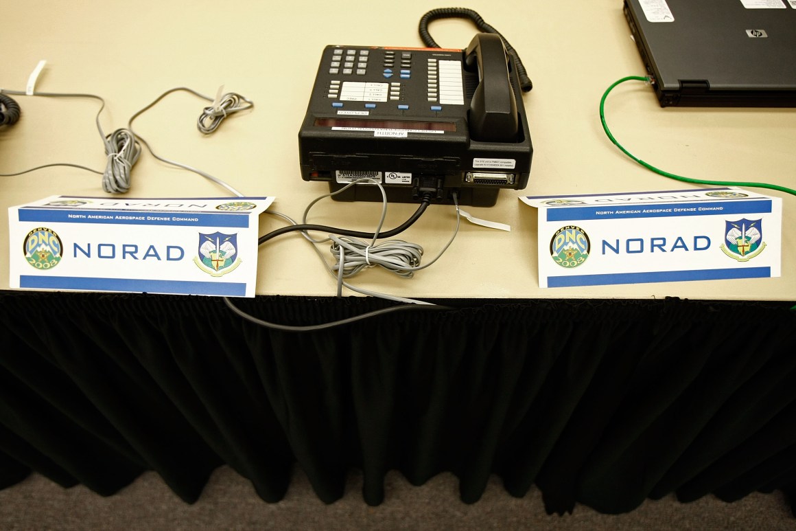 A phone sits on a table at the North American Aerospace Defense Command.