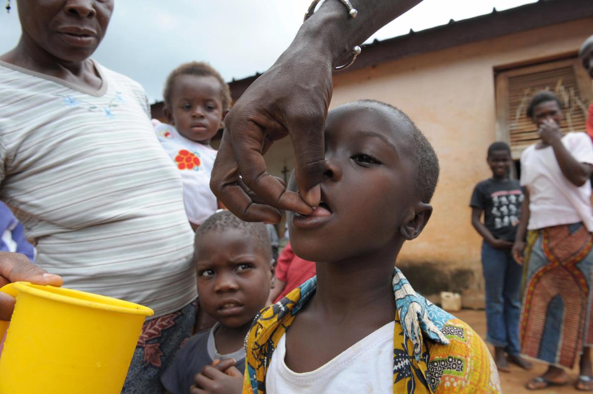 A nurse, Mamadou Kone, gives medicine for river blindness, caused by a parasitic worm and spread by the bite of an infected blackfly, on September 27th, 2008.