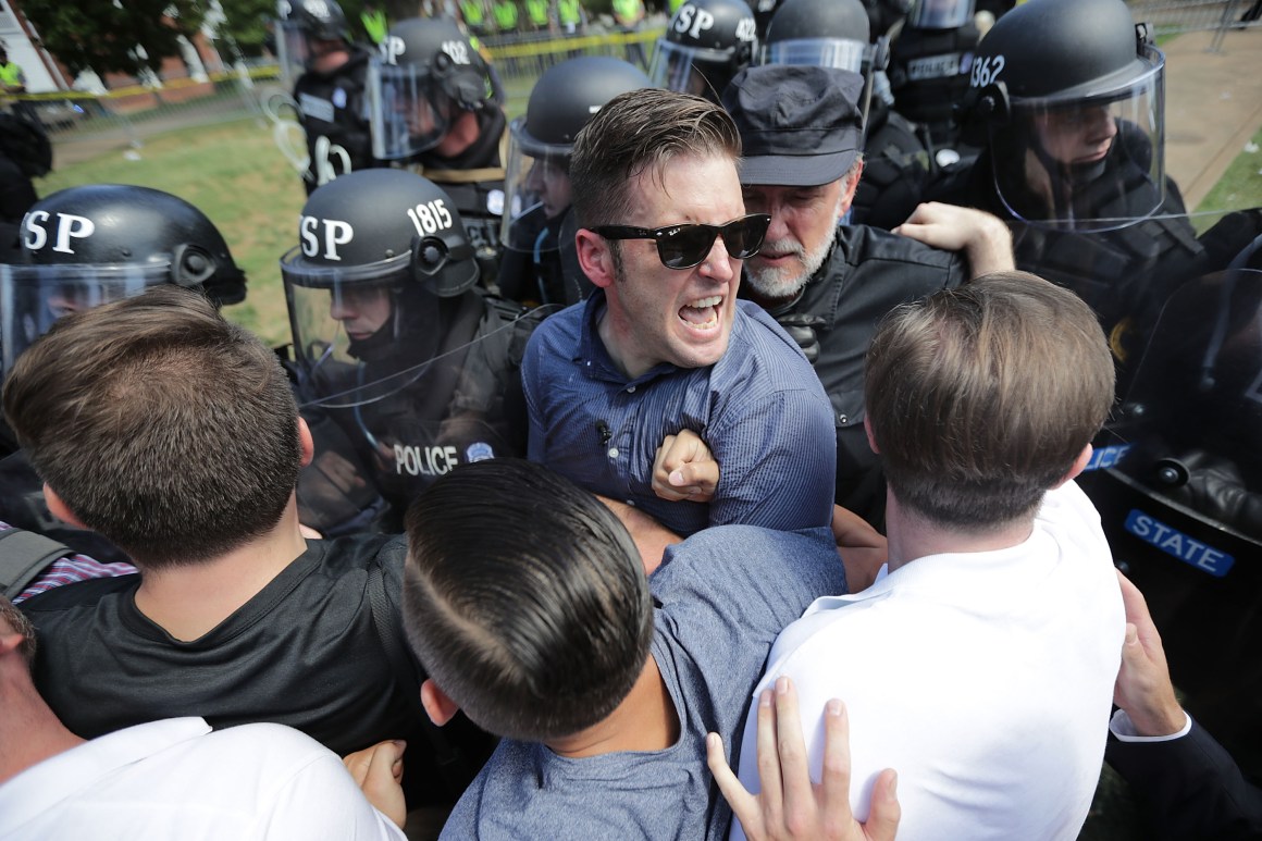 White nationalist Richard Spencer and his supporters clash with Virginia State Police in Emancipation Park after the "Unite the Right" rally was declared an unlawful gathering August 12th, 2017, in Charlottesville, Virginia.