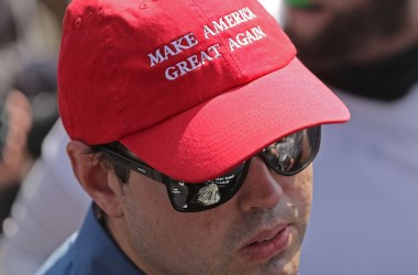 A man wears a Make America Great Again hat during the Unite the Right rally on August 12th, 2017, in Charlottesville, Virginia.