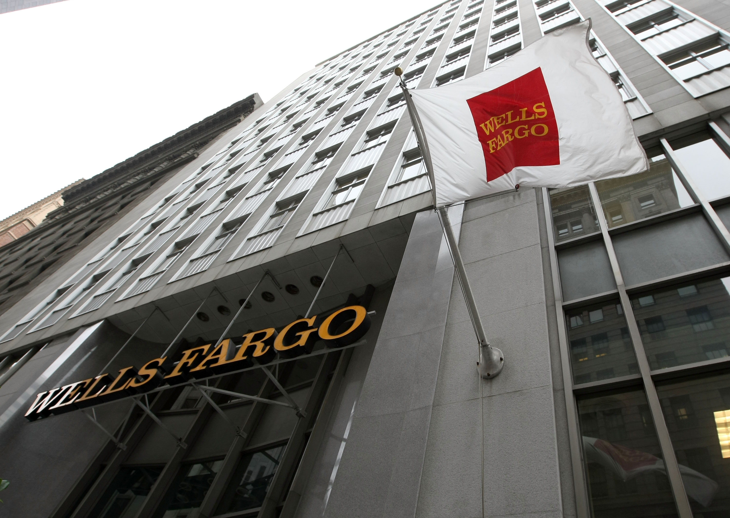 A flag waves outside of a Wells Fargo bank branch on October 3rd, 2008, in San Francisco, California.