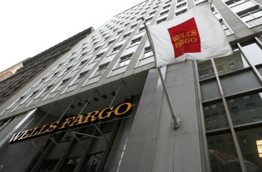 A flag waves outside of a Wells Fargo bank branch on October 3rd, 2008, in San Francisco, California.