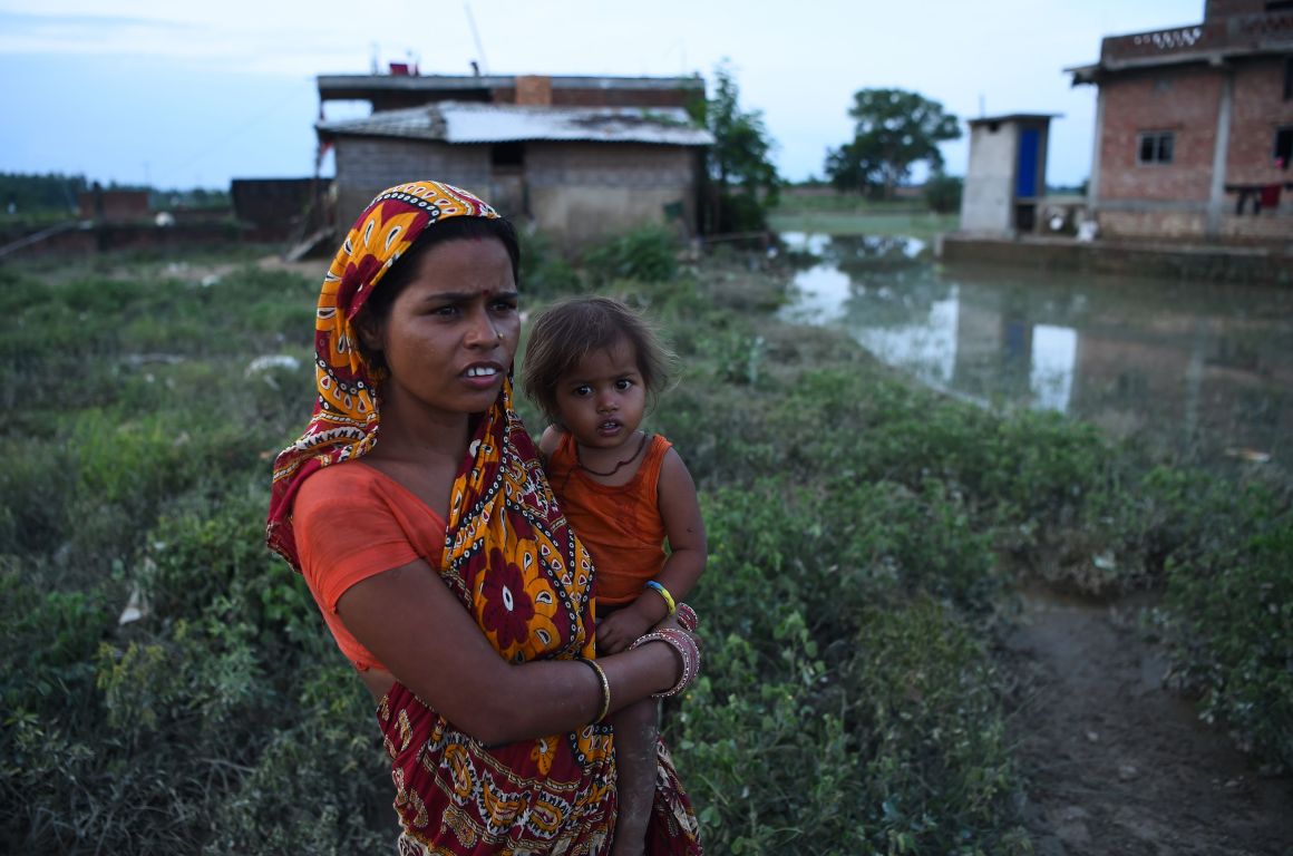 A Nepali woman with her child in Janakpur.