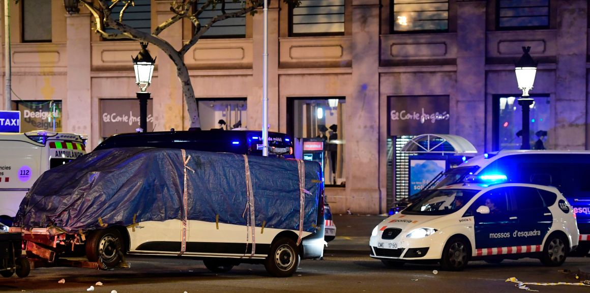 The van that ploughed into a crowd, killing at least 13 people and injuring around 100 others is towed away from the Rambla in Barcelona on August 18th, 2017. A driver deliberately rammed a van into a crowd on Barcelona's most popular street on August 17th, 2017, police said. Officers in Spain's second-largest city said the ramming on Las Ramblas was a 'terrorist attack'. The driver of a van that mowed into a packed street in Barcelona is still on the run, Spanish police said.