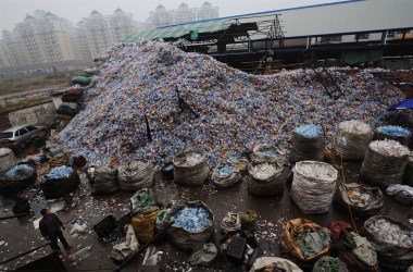 Used plastic bottles remain heaped up at a recycling mill in Wuhan of Hubei Province, China.