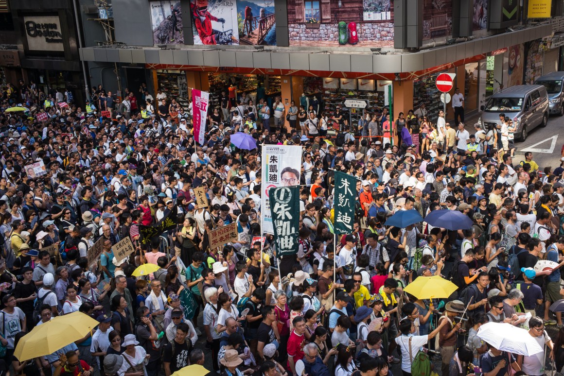 Protesters attend a rally to support jailed activists Joshua Wong, Nathan Law, and Alex Chow on August 20th, 2017, in Hong Kong, China.