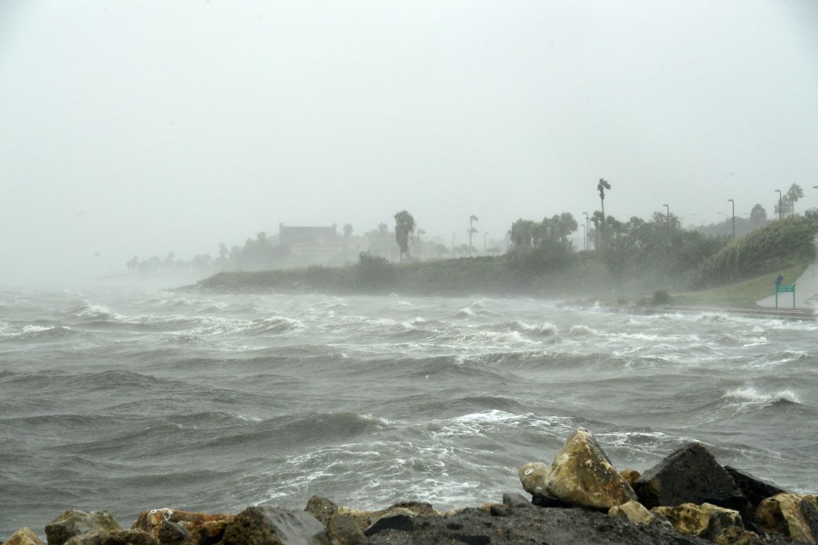 Strong winds batter seaside houses before the approaching Hurricane Harvey in Corpus Christi, Texas, on August 25th, 2017.